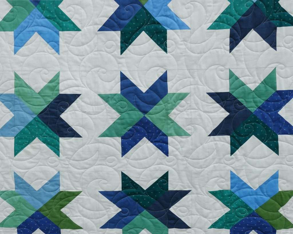 make this modern star quilt pattern using fat quarters