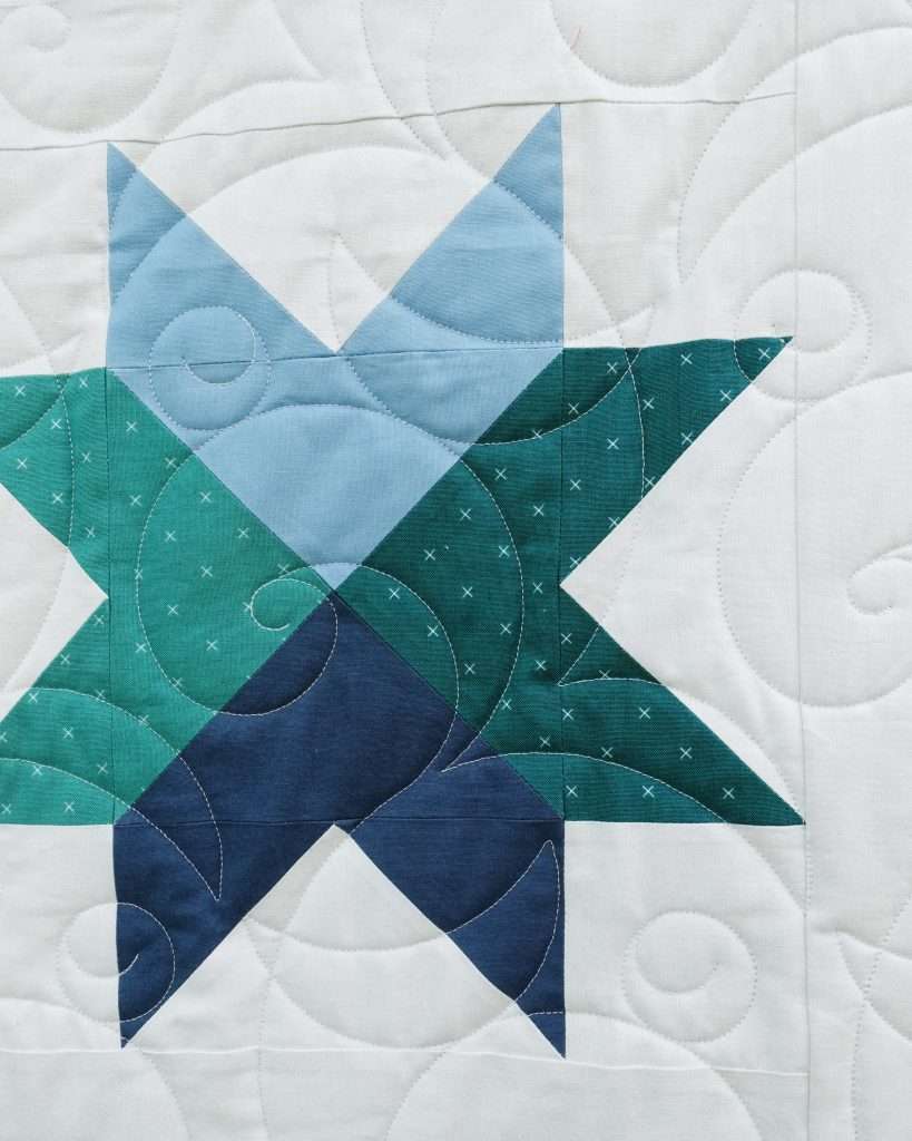 star quilt featuring Flying Geese quilt blocks