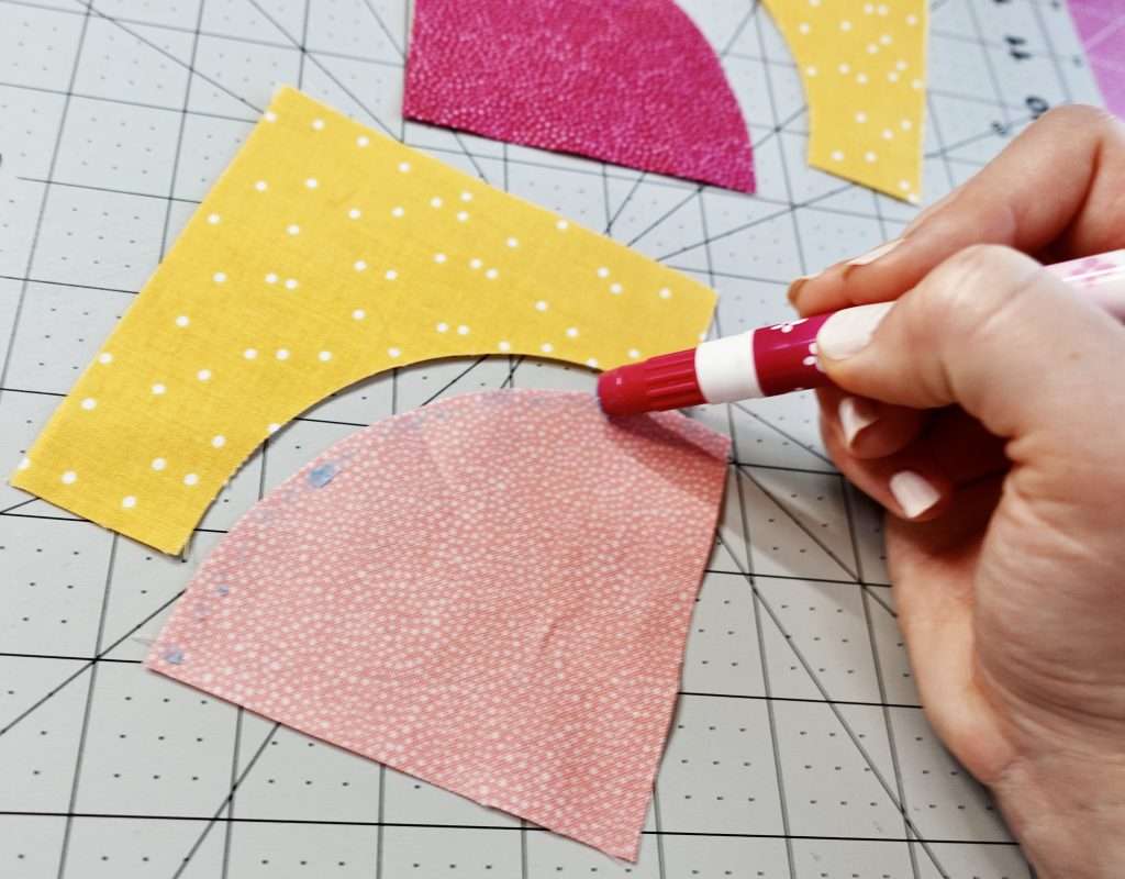 use a glue stick to baste curved fabric pieces together before sewing perfect curves