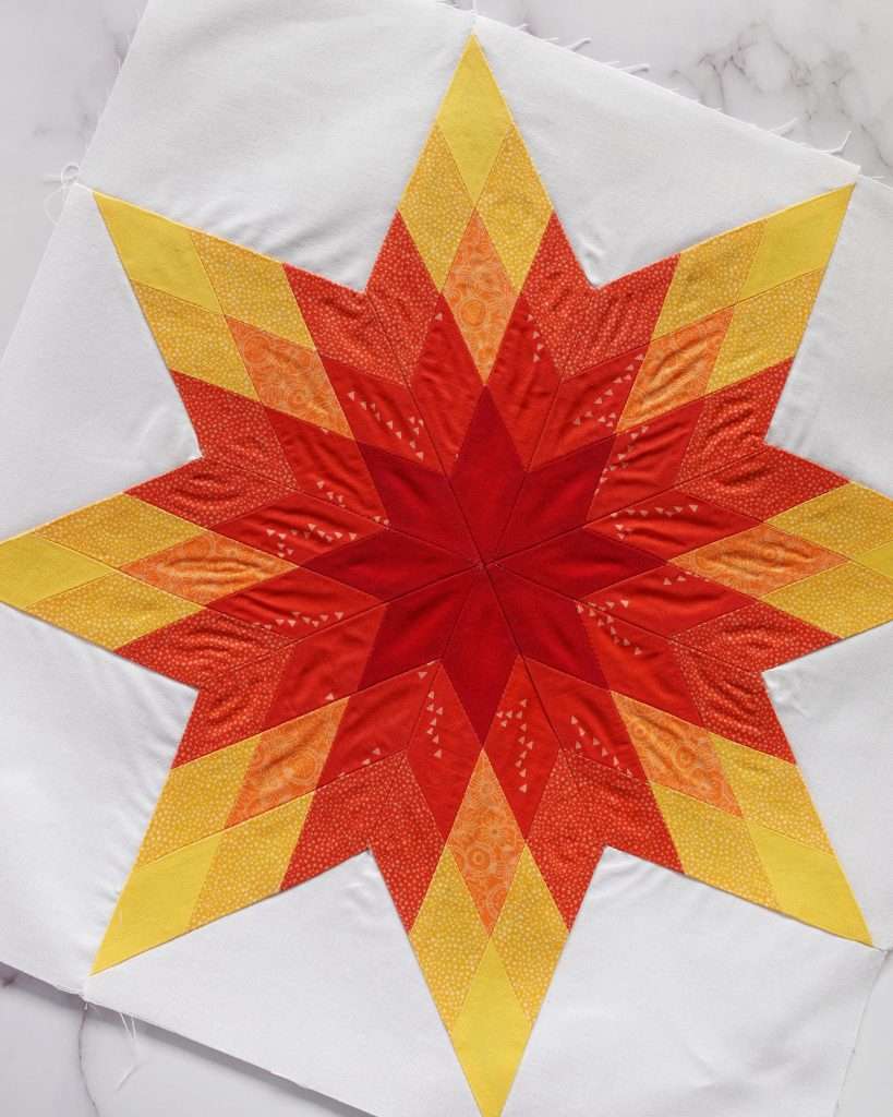 free quilt block pattern to make a prairie star quilt block using AccuQuilt fabric cutting machine