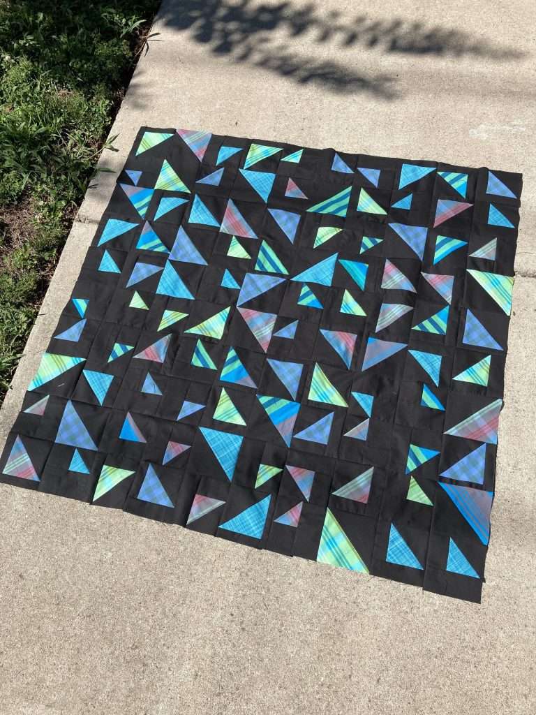 black background quilt, triangular quilt