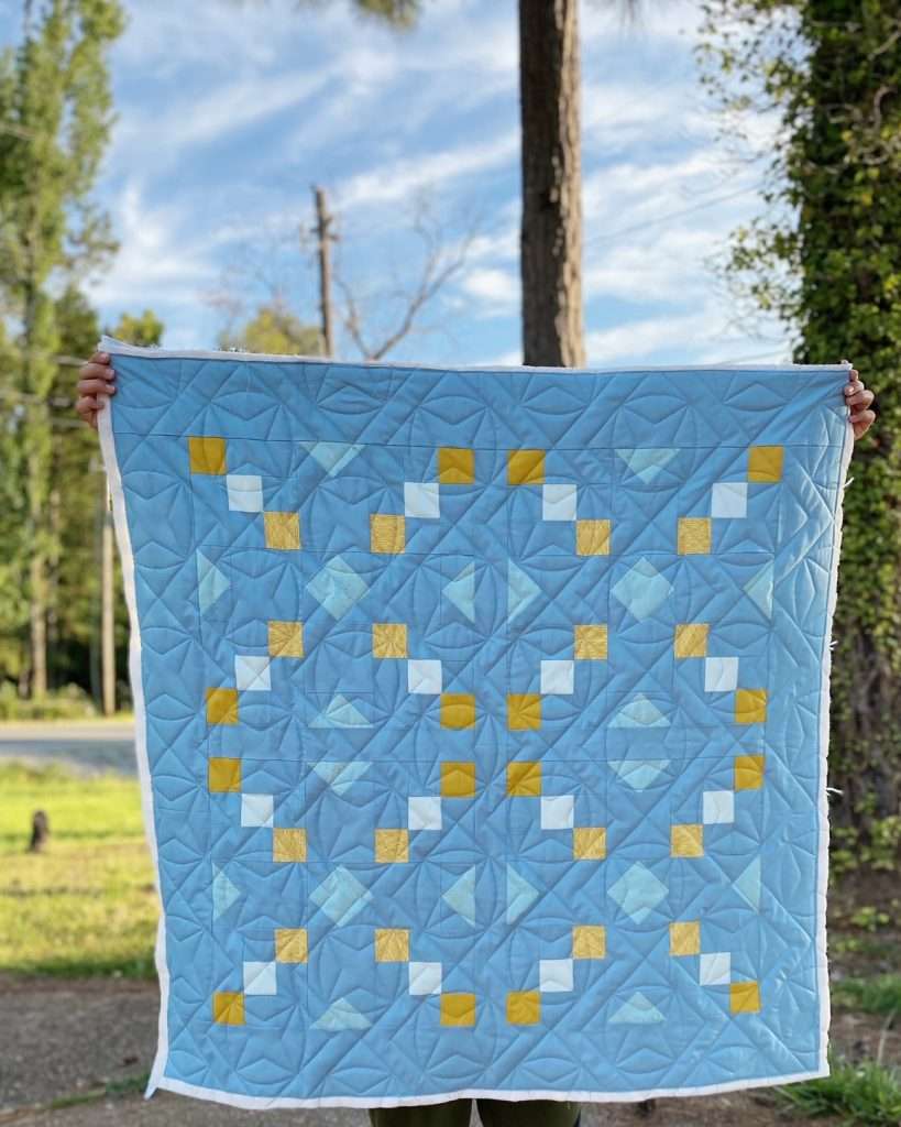blue and gold modern baby quilt