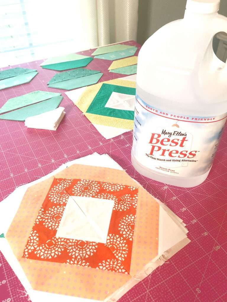 tips for pressing while quilting, ironing tips for quilting, AccuQuilt String Quilt Blocks, angles companion qube, chain sewing, modern quilting, learning to quilt, how to use accuquilt, free quilting tutorials, modern quilt pattern