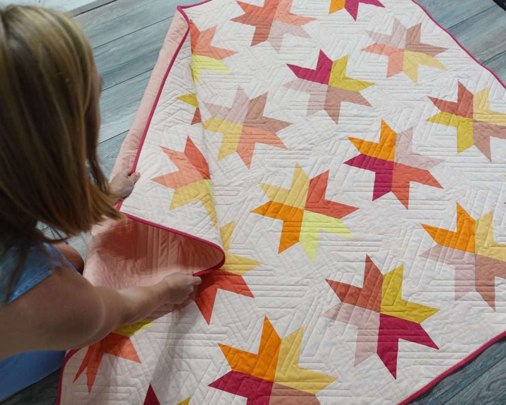 Learn how to make the Beaming Quilt Pattern by Homemade Emily Jane