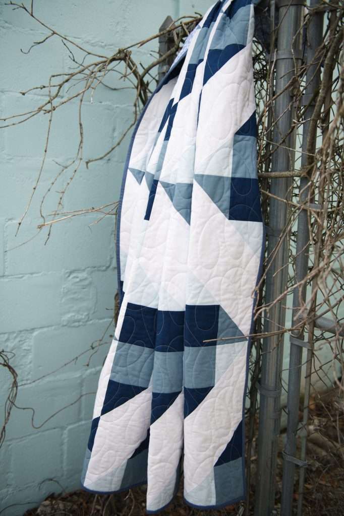 Navy and white throw size quilt