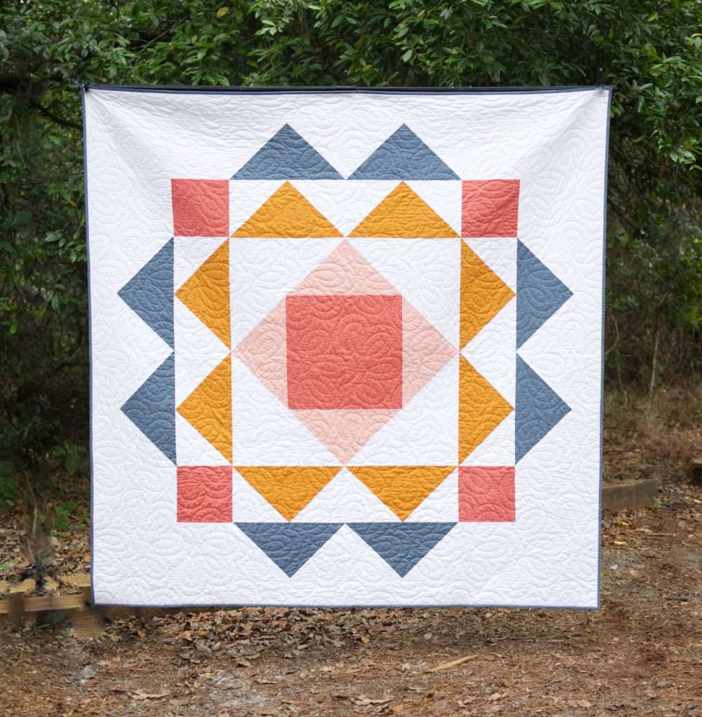 Throw size paradigm quilt by homemade emily jane, large single block quilt pattern featuring flying geese and economy quilt block