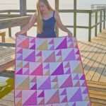 baby girl half square triangle quilt made with Gingham Play by Michael Miller fabrics