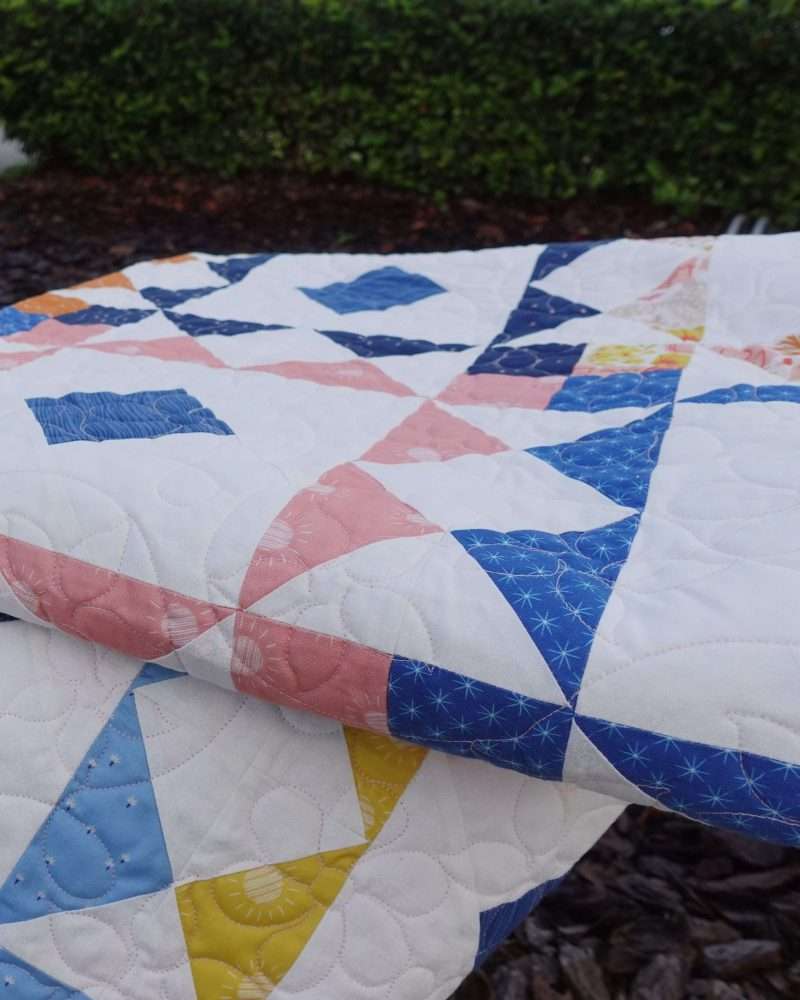 Reverberate modern quilt pattern, fat quarter quilt, brightly colored quilt, flying geese quilt, quilting tutorial