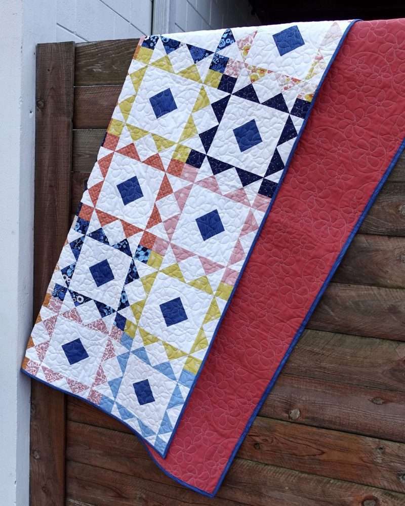 Reverberate modern quilt pattern, fat quarter quilt, brightly colored quilt, flying geese quilt, quilting tutorial