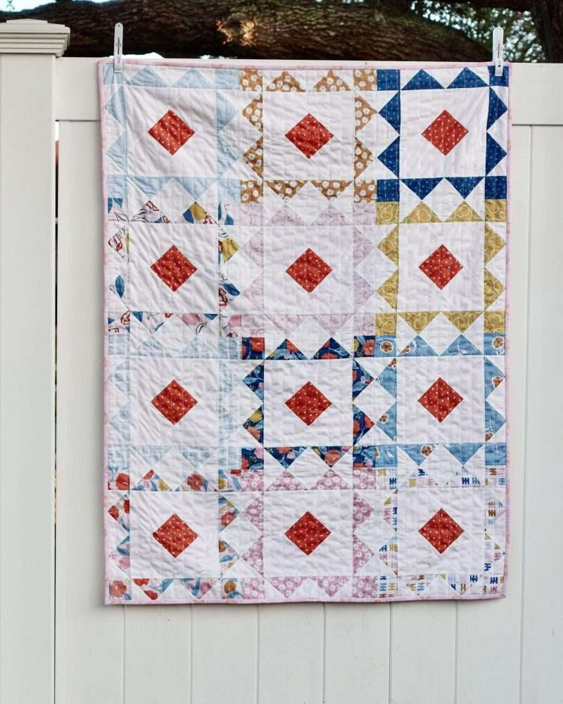 Reverberate modern quilt pattern, fat quarter quilt, brightly colored quilt, flying geese quilt, quilting tutorial, fat quarter fabrics, homemadeemilyjane