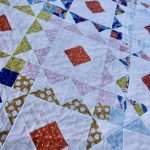 Reverberate modern quilt pattern, fat quarter quilt, brightly colored quilt, flying geese quilt, quilting tutorial, fat quarter fabrics, homemadeemilyjane