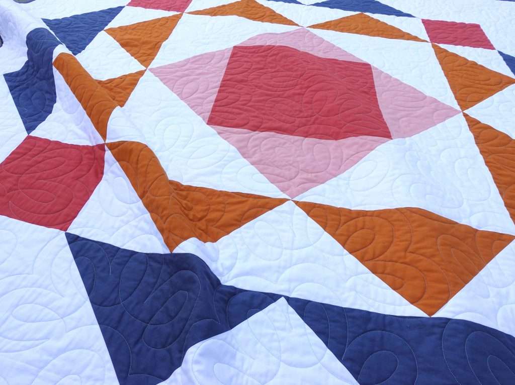 modern single block quilt pattern paradigm by homemade emily jane, throw size quilt with big block, fast and easy modern quilt pattern